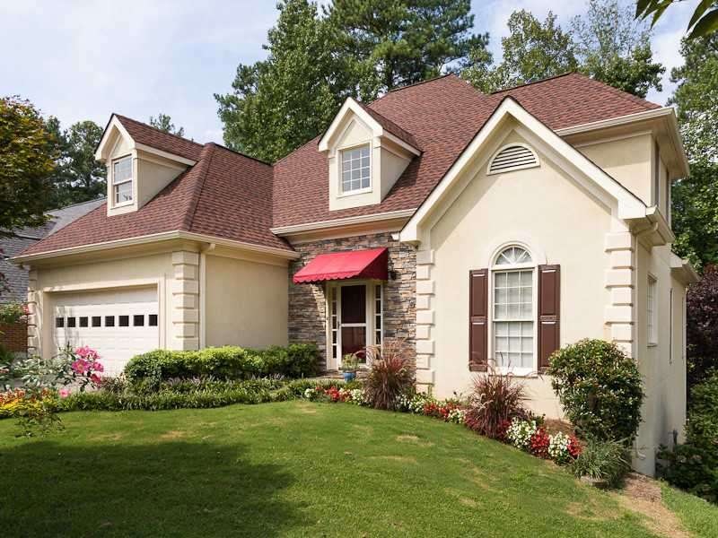 Exterior Front. Hardcoat Stucco