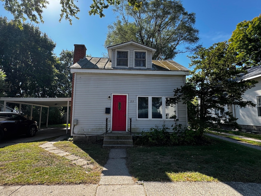 213 W Montcalm St, Greenville, MI 48838 - photo 1