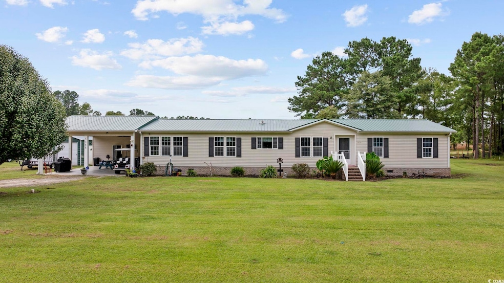 View of front of home featuring a front lawn