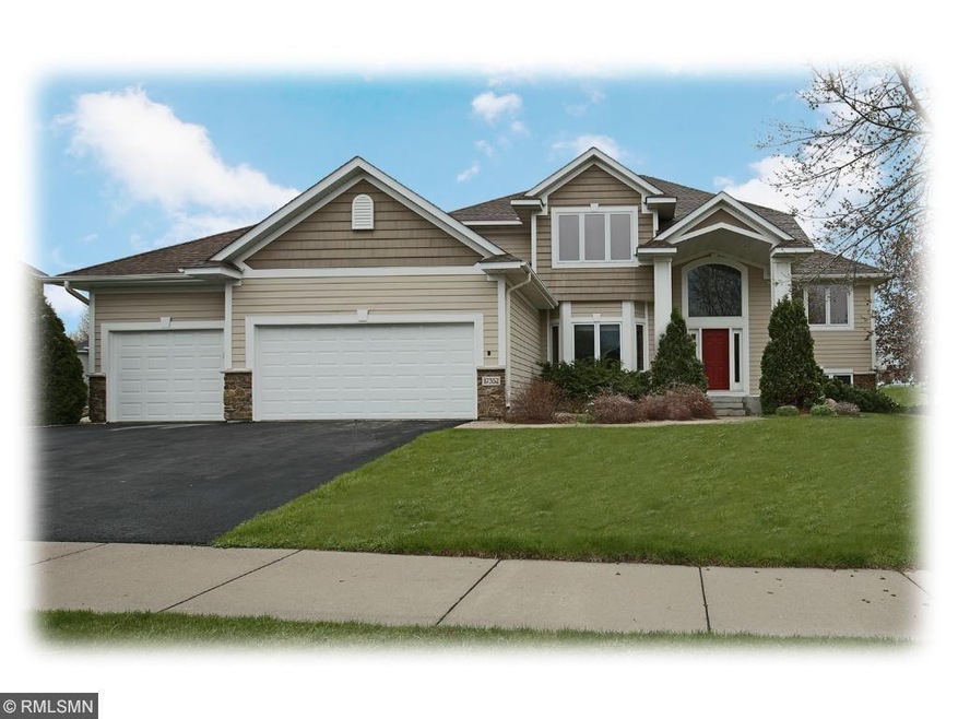 This grand two-story home is nestled on a beautifu