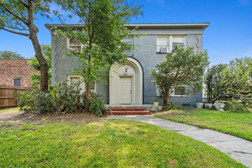 8 units, 2 buildings. This is the brick building in front. This building has 4 one bedroom units.