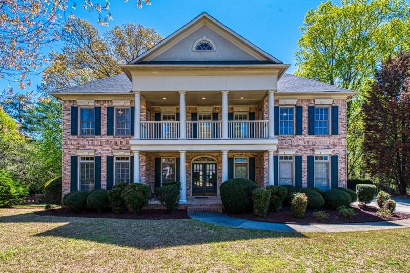 Stately and Elegant 3-Sided Brick Executive Home