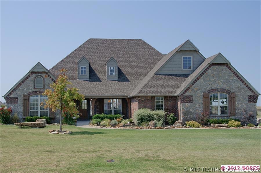 Front of the house sitting on 2 acres.