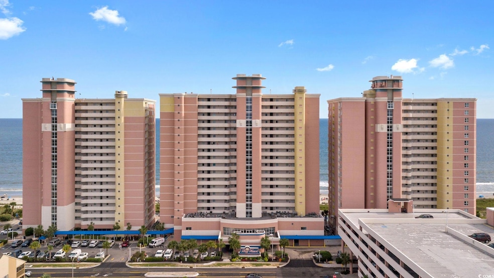 View of building exterior featuring a water view