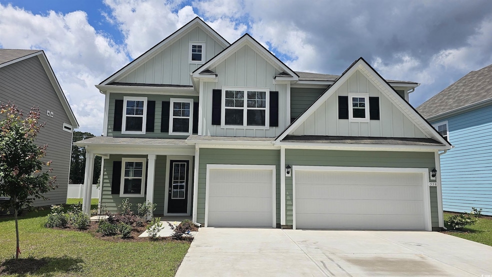 Craftsman-style home featuring board and batten si