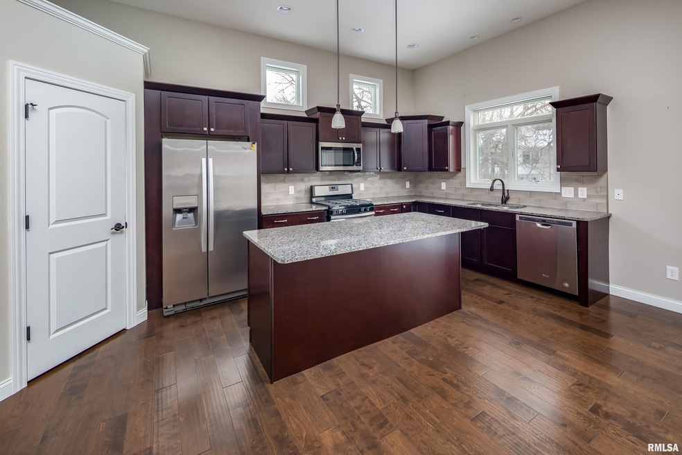 1623 Irish Woods Cir, Davenport, IA 52807 - photo 1