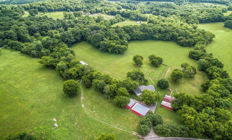 View of house and some of the outbuildings 