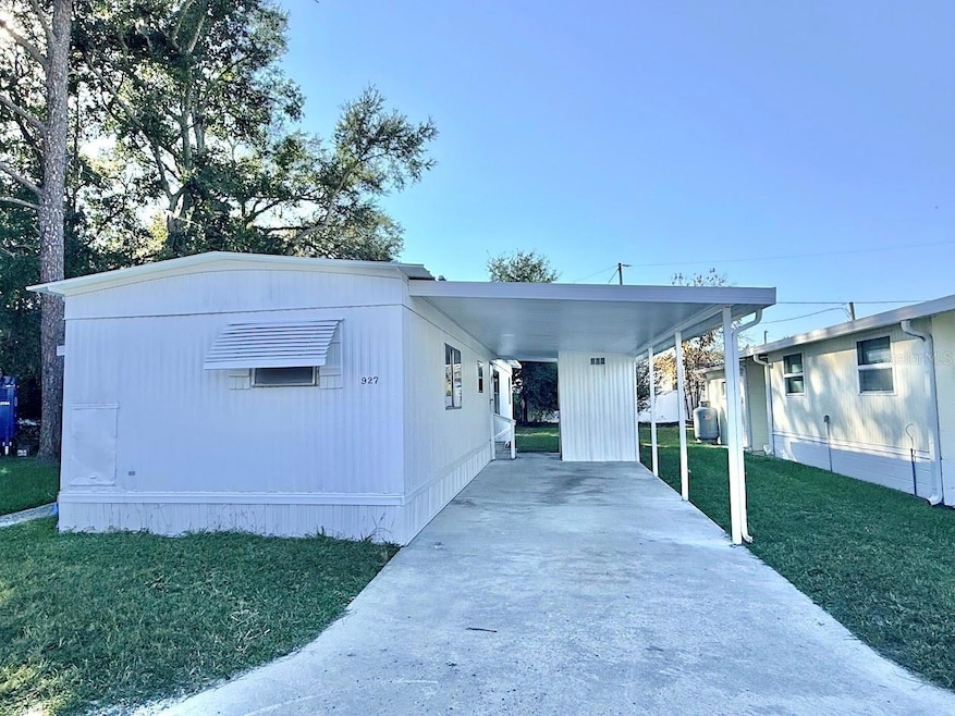 927 Village Dr, Wildwood, FL 34785 - photo 1