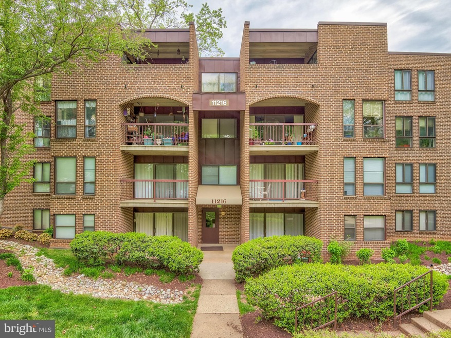 11216 Chestnut Grove Square unit 220, Reston, VA 20190 - photo 1
