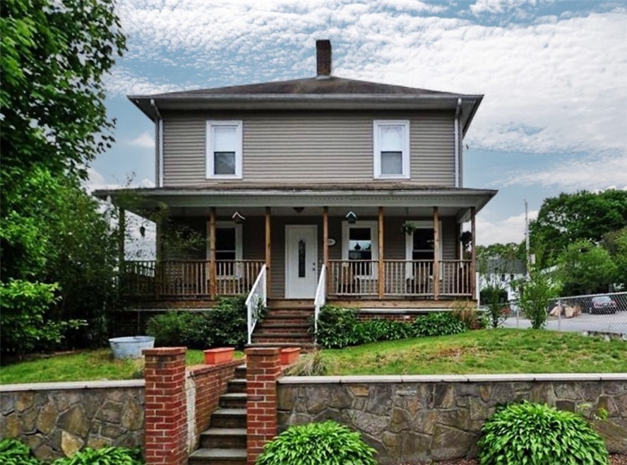 Front of home from West Warwick Ave in summer