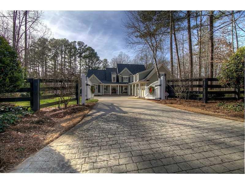 Exterior Front. Private estate home with lake view