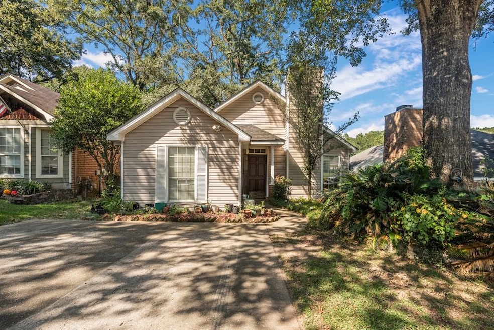 View of front of home with a chimney