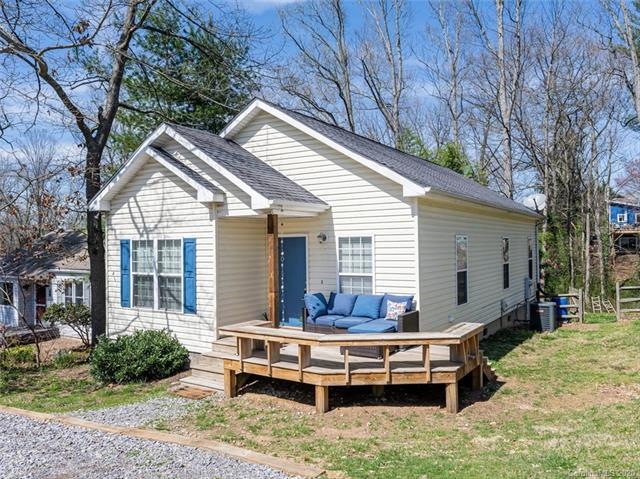 Over 1080 sqft of light and bright main-level living in this adorable home tucked away in a picturesque, stroll-able West Asheville neighborhood, close to the eclectic charm and fun of Haywood Rd.