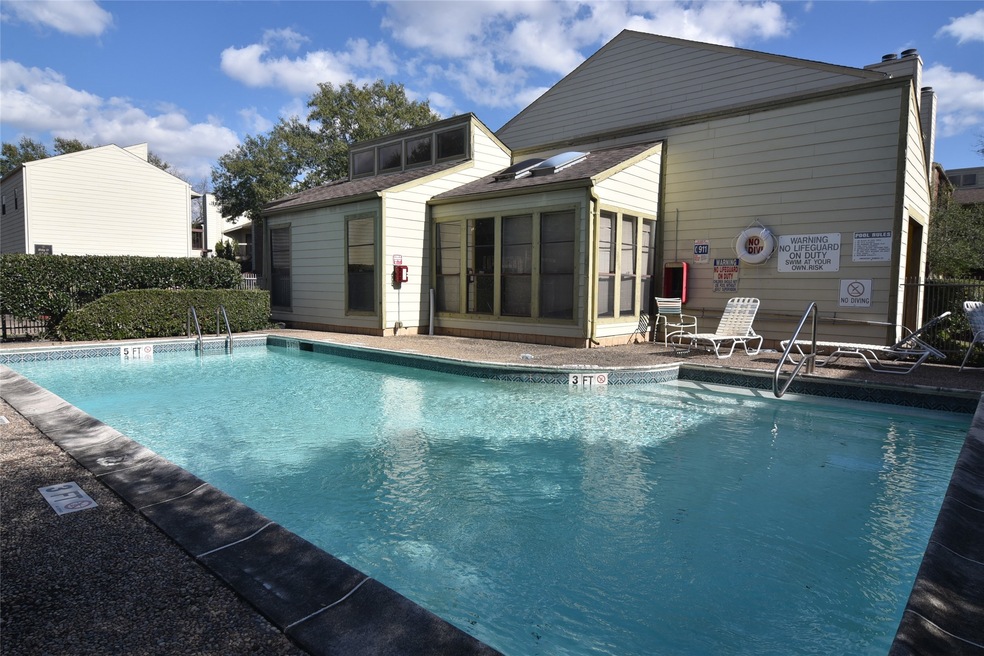 clubhouse adjacent to pool