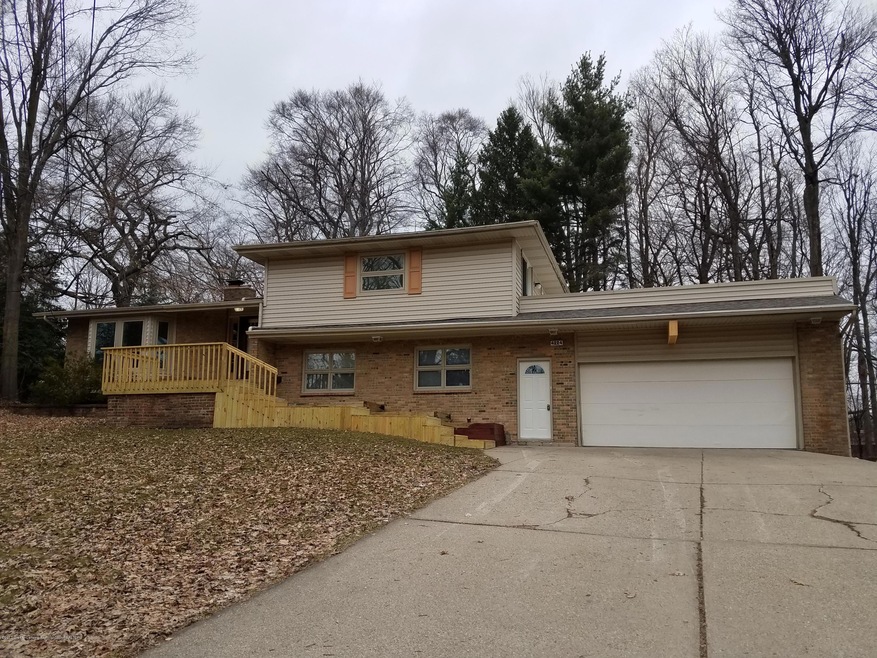 4224 Knoll Cir, Lansing, MI 48917 - photo 1