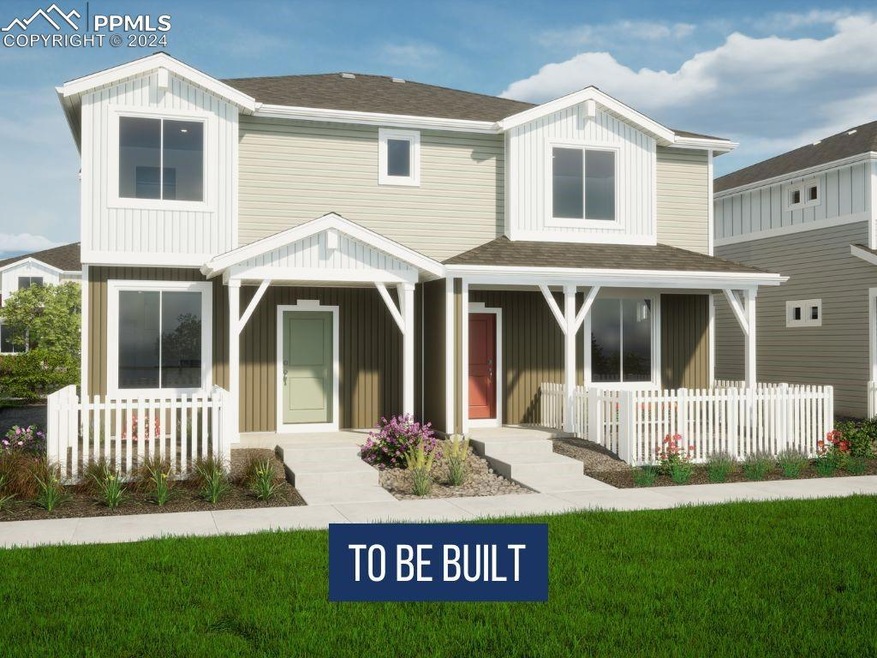 Back of house featuring a porch and a yard