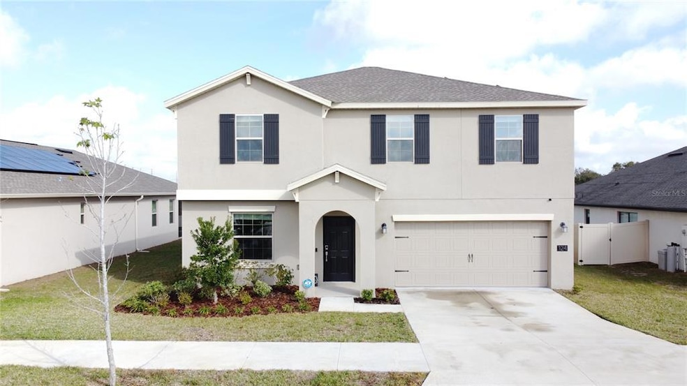 124 Bergamot Loop, Davenport, FL 33837 - photo 1