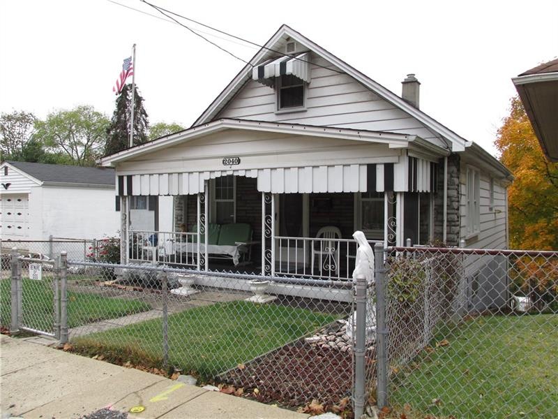 Level entry bungalow with fenced yard and welcomin