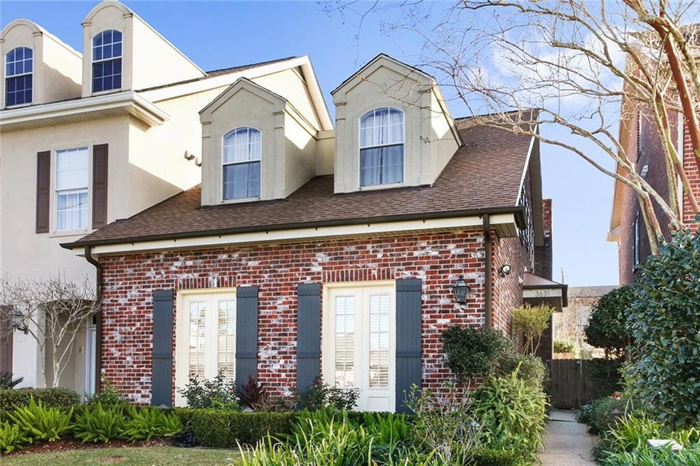 Front exterior. Lush yard and extended walkway. Sp