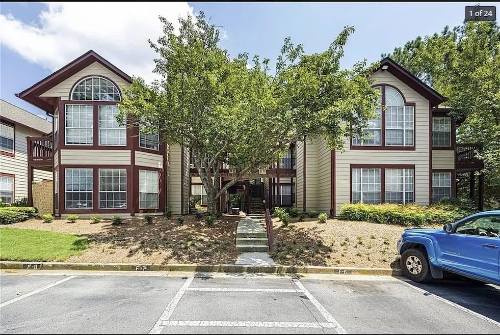 View of front of house featuring uncovered parking
