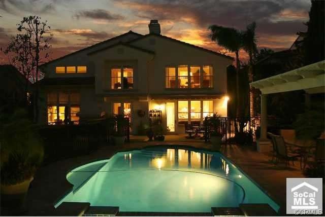 Night shot of backyard pool