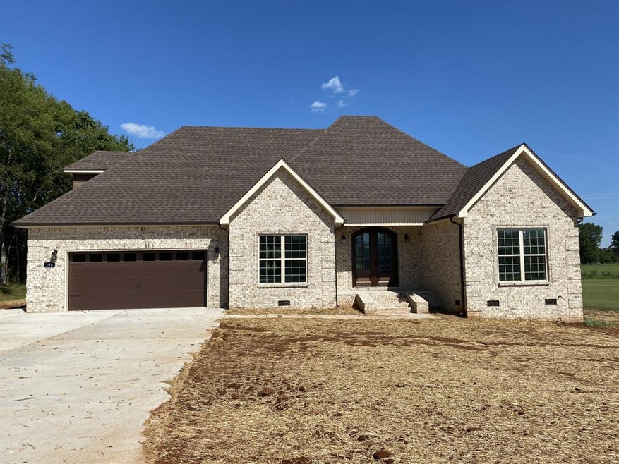 House in picture similar to one being built 