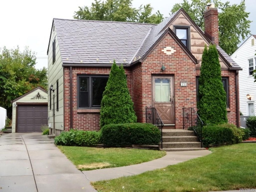 Well Cared For Brick faced Cape with 1.5 Car Detac