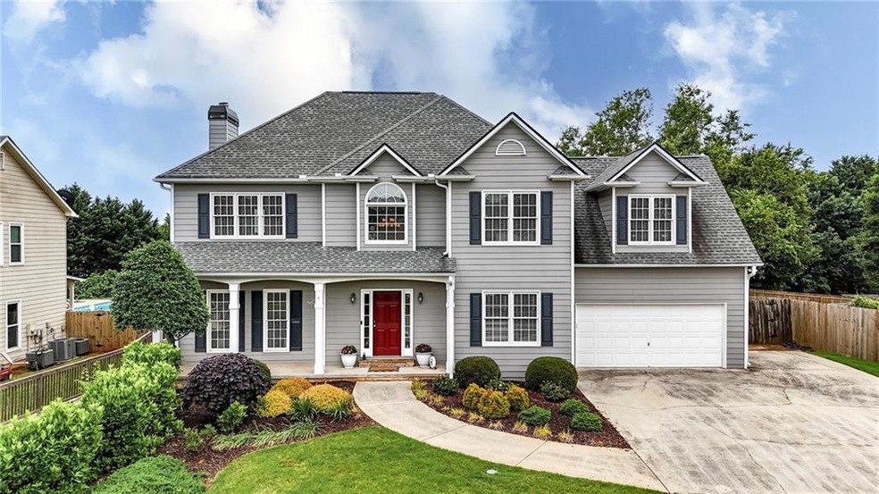 Beautiful well maintained home in desirable Woodstock GA