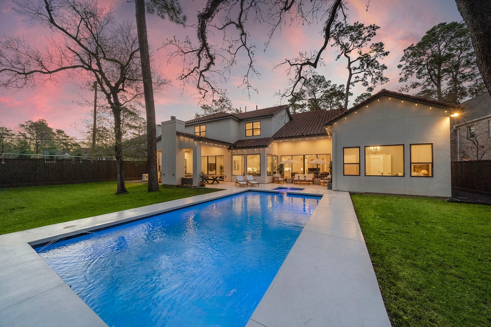 Experience luxury living with a pristine heated po