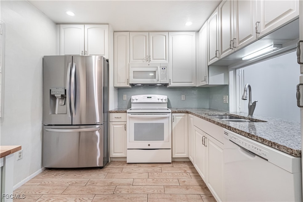 1747 Pebble Beach Dr unit 216, Fort Myers, FL 33907 - photo 1