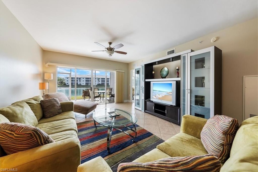 Living room featuring light tile patterned floorin