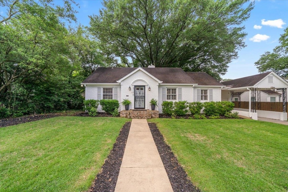 Ranch-style home featuring brick siding and a front yard