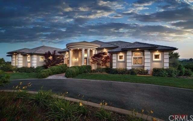 This custom home sits perched at the top of the 14