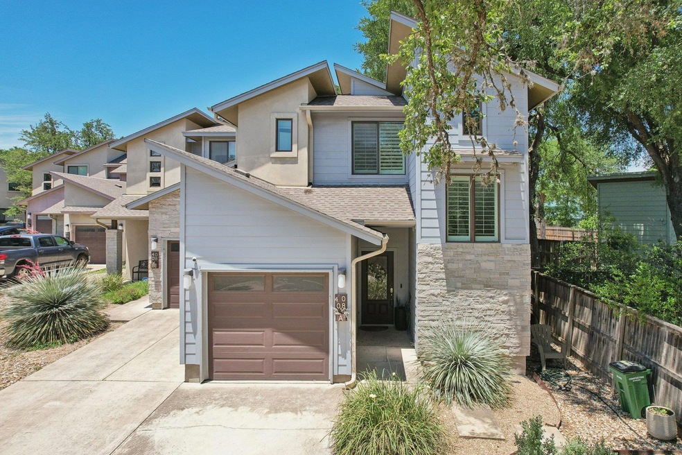View of front of home featuring concrete driveway