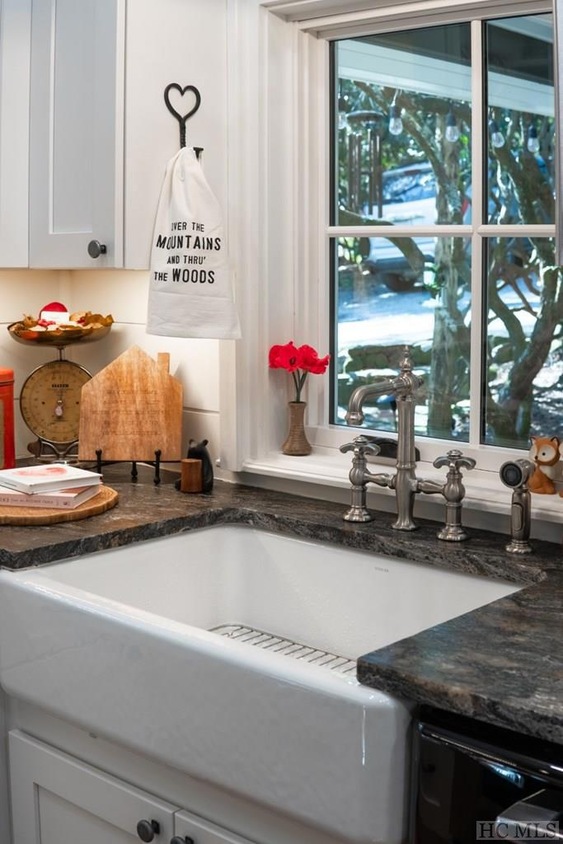 Kohler farmhouse sink with vintage inspired faucet