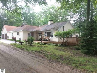 7581 Maple St, Grawn, MI 49637