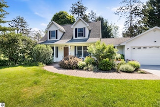 9075 Windsong Ln, Cadillac, MI 49601