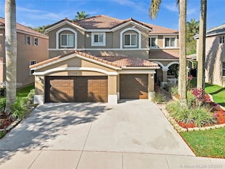 614 Honeysuckle Ln, Weston, FL 33327