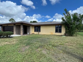 1061 SE Lansdowne Ave, Port Saint Lucie, FL 34983