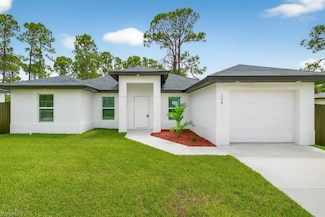 708 Lamar St E, Lehigh Acres, FL 33974