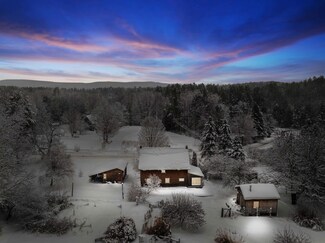 97 Whitcomb Island Rd, Hyde Park, VT 05655