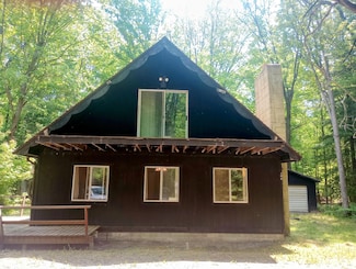 206 Redwine Dr, Houghton Lake, MI 48629