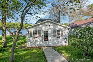 141 N Coolidge Dr, Six Lakes, MI 48886