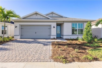 619 Lakeside Oasis Ave, Lehigh Acres, FL 33936