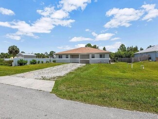 909 Jaguar Blvd, Lehigh Acres, FL 33974