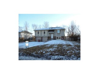 205 Village Ln, Buckner, MO 64016