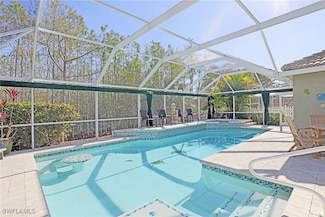 1579 Whispering Oaks Cir, Naples, FL 34110