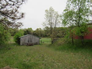7034 Schow Rd, Holton, MI 49425