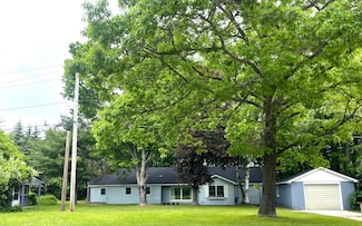 7818 Homestead Rd, Benzonia, MI 49616