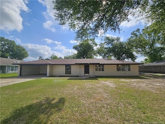 203 S Storer Ave, Iowa, LA 70647